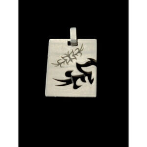 Sterling Silver cutout ( symbol unknown) with butterfly etching pendent